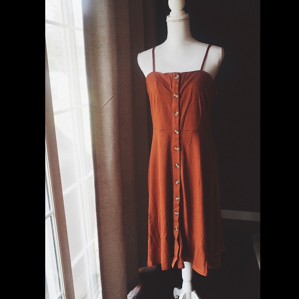 2/$30 Rust/copper colored button down midi dress.